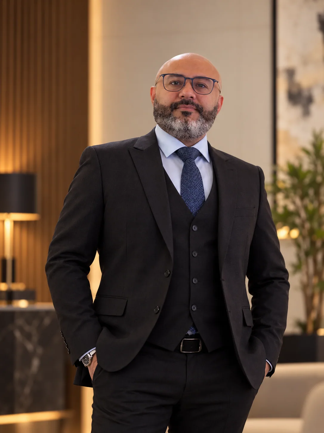 Karim Serageldin in formal dark suit